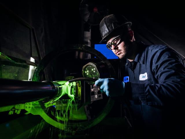 MPI Testing - Magnetic Particle expert performing an MPI test.